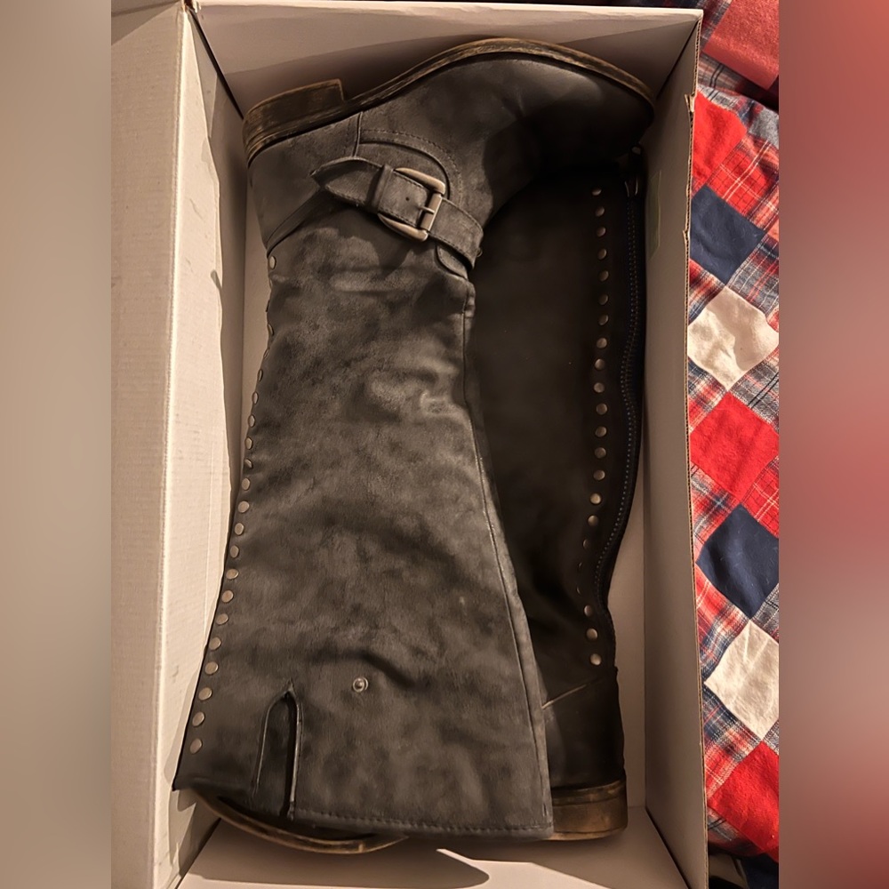 Grey riding boots
